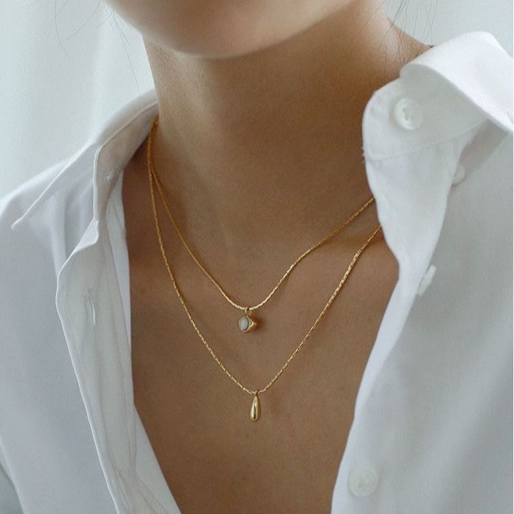 Collier double couche avec pendentif en opalite contre le mauvais œilnorma Olivenorma 