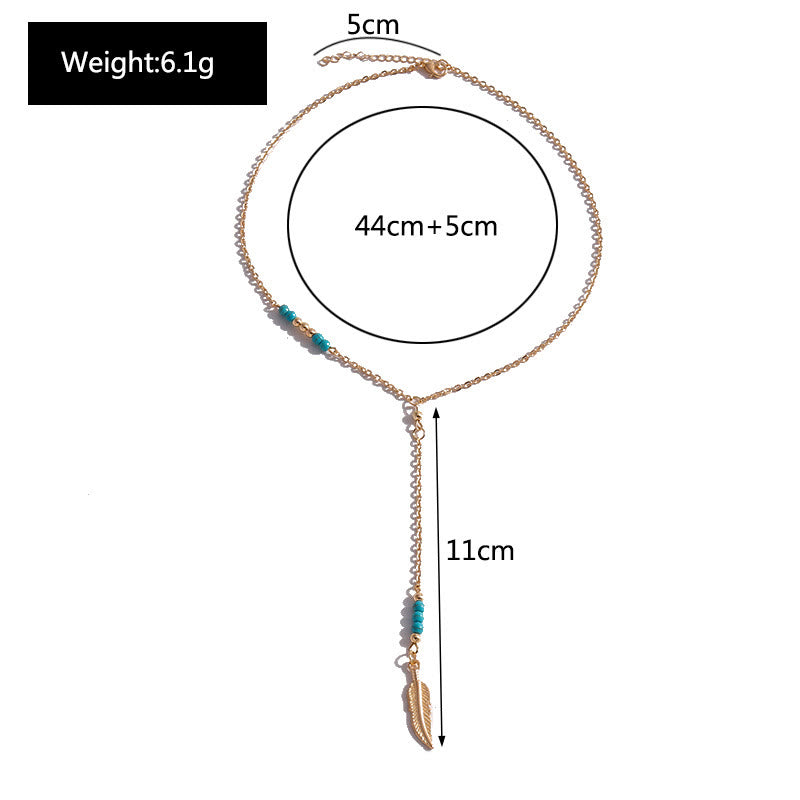 Collier bohème en argent et or avec pendentif en forme de feuille turquoise Olivenorma