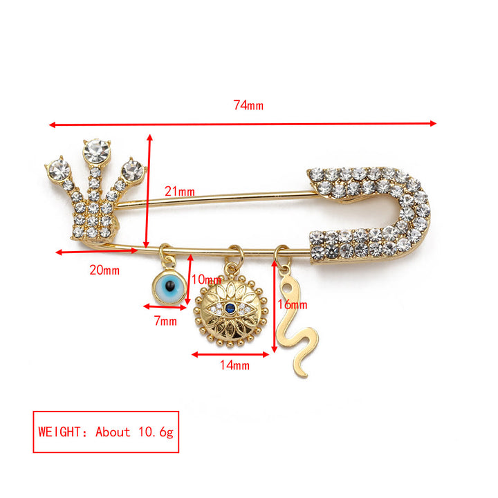 Broche en forme de cœur avec mauvais œil en zircon blanc Olivenorma 