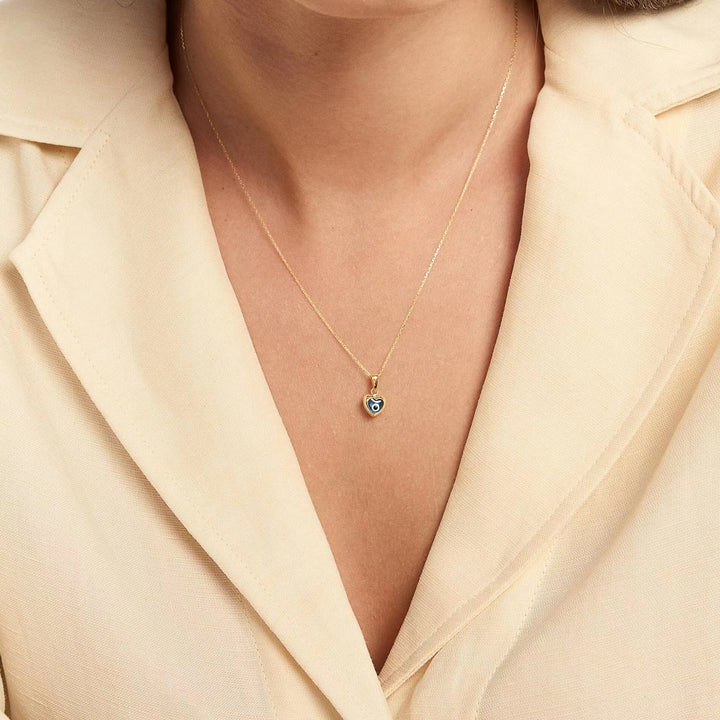 Collier en acier titane avec topaze bleue et mauvais œil Olivenorma