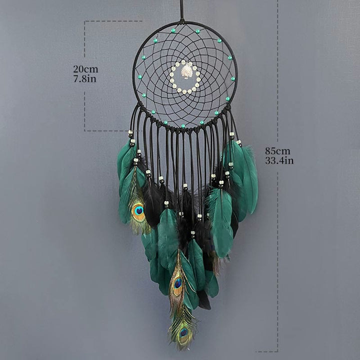 Attrape-rêves en plumes de paon fait main avec perles phosphorescentes Olivenorma