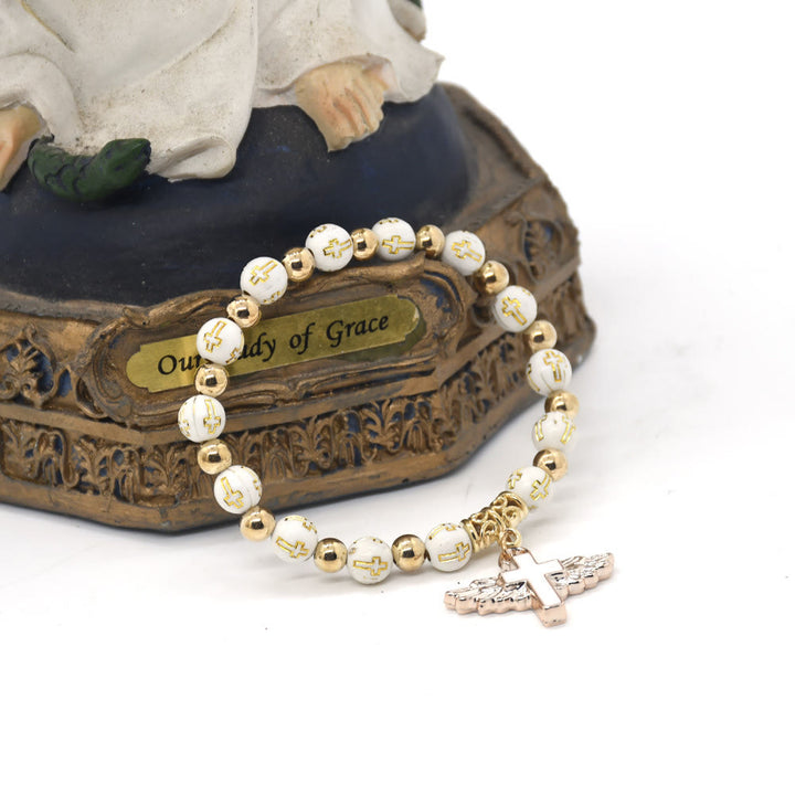 Bracelet en perles de jade blanc avec croix Olivenorma 