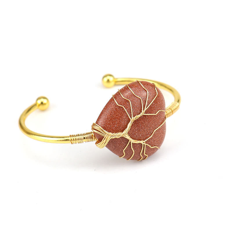 Bracelet en cristal naturel en forme de cœur enveloppé de fil de cuivre doré Olivenorma 