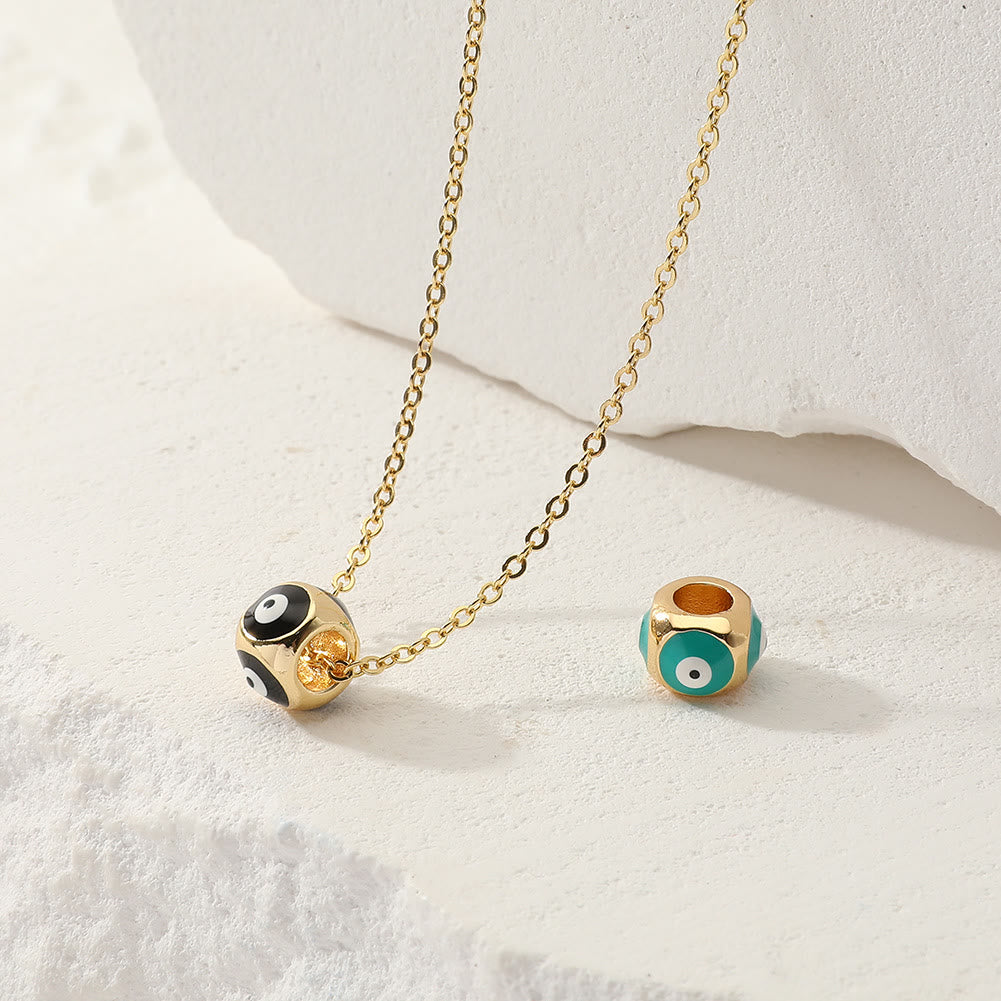 Collier pendentif rond contre le mauvais œil dégoulinant d'huile Olivenorma 