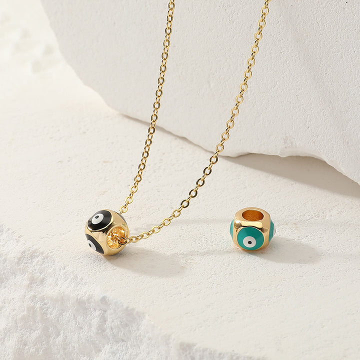 Collier pendentif rond contre le mauvais œil dégoulinant d'huile Olivenorma 
