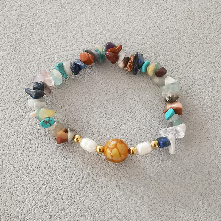 Ensemble de quatre bracelets en perles de cristal naturel Olivenorma