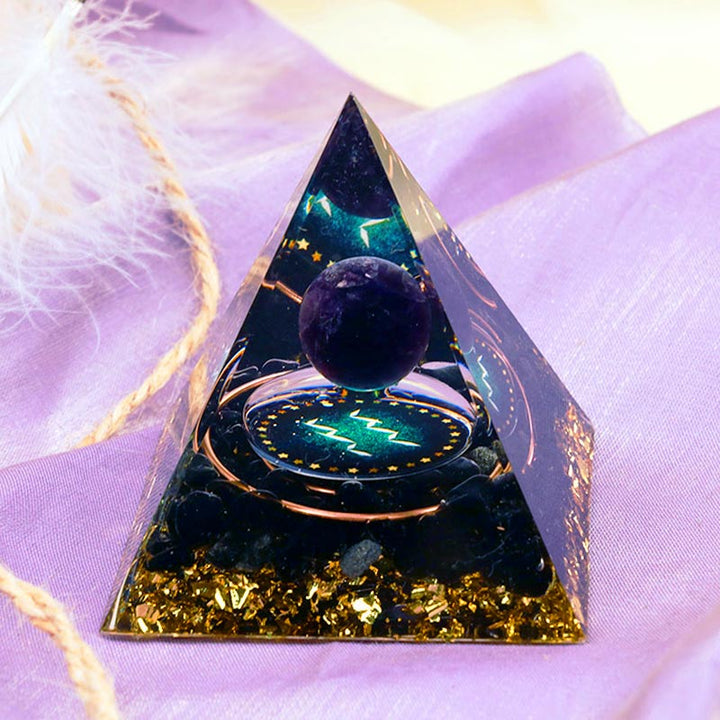 Sphère d'améthyste Olivenorma avec pyramide d'orgone du zodiaque Verseau en obsidienne 