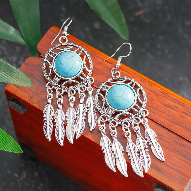 Boucles d'oreilles à pompons en plumes turquoise style bohème Olivenorma - image 2