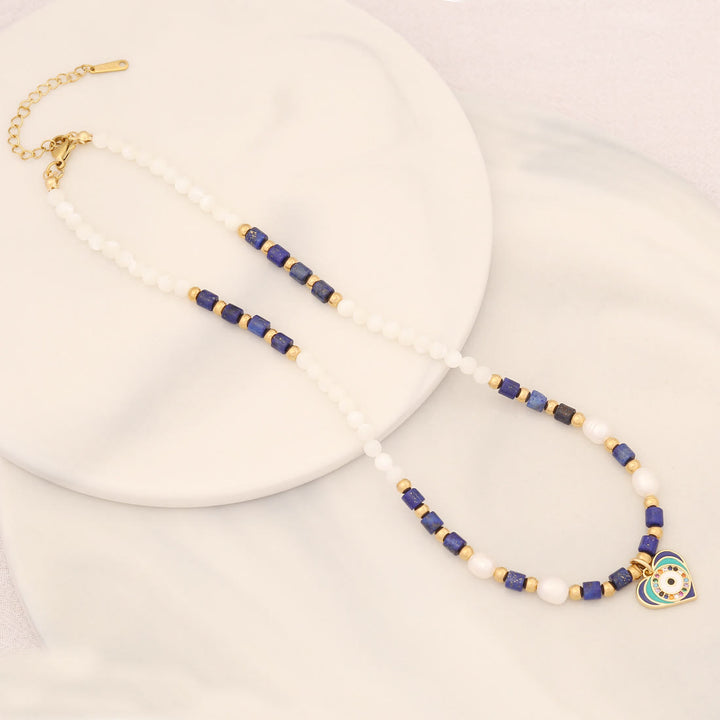 Collier pendentif mauvais œil en pierre de cristal de perle naturelle Olivenorma 