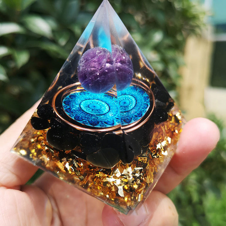 Pyramide d'orgone en améthyste Olivenorma avec tourmaline noire