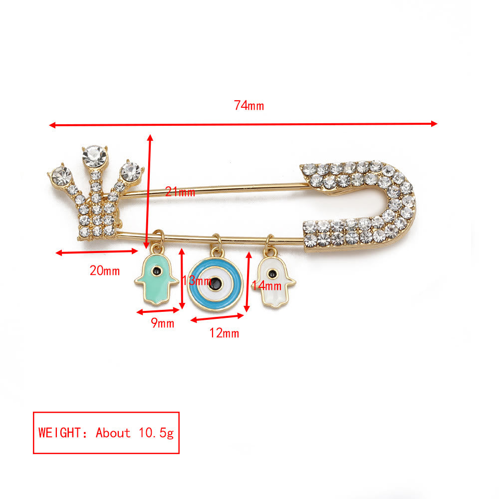 Broche en forme de cœur avec mauvais œil en zircon blanc Olivenorma 
