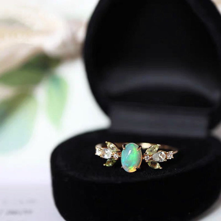 Bague en or avec feuille d'opale délicate et zircone Olivenorma