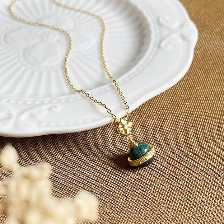 Collier pendentif en forme de sphère en grès bleu malachite « Stellar Corona » Olivenorma
