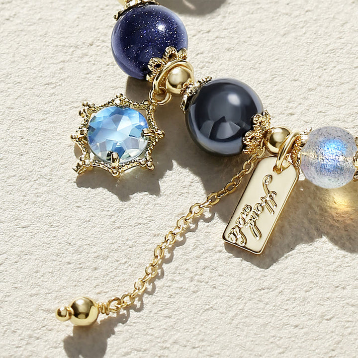 Bracelet de perles en obsidienne et pierre de lune en grès bleu Olivenorma 