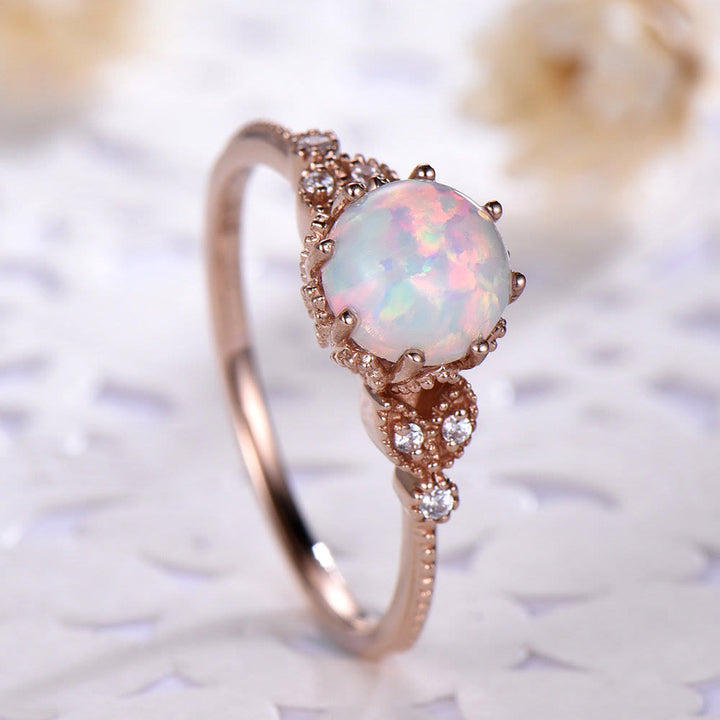 Olivenorma ronde en pierre de lune et opale blanche avec zircon