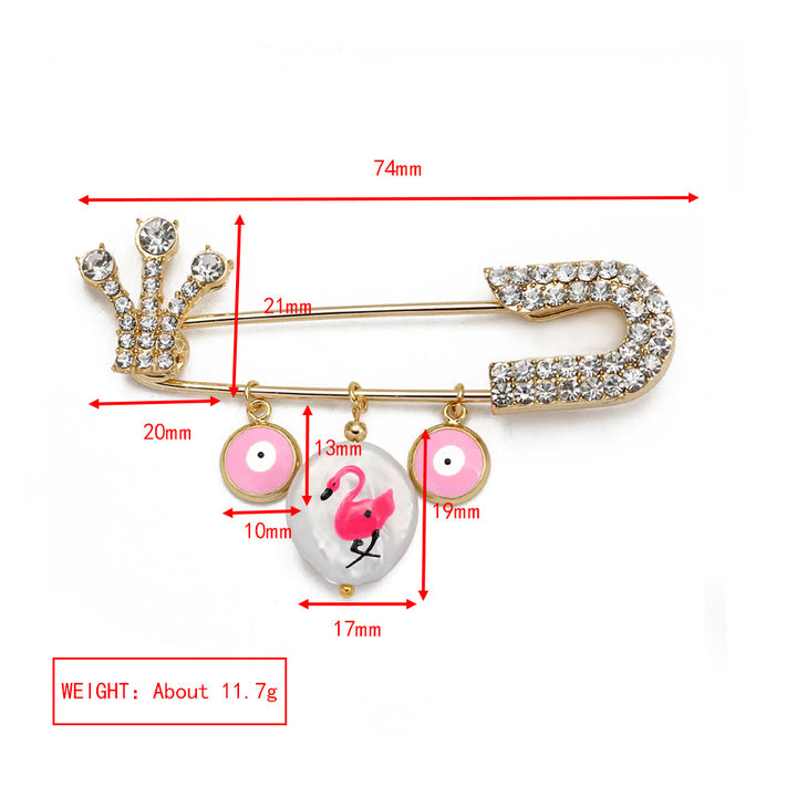 Broche en forme de cœur avec mauvais œil en zircon blanc Olivenorma 