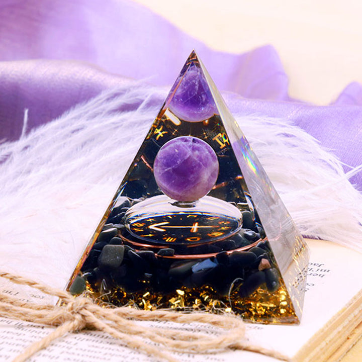 Sphère d'améthyste Olivenorma avec pyramide d'orgone du zodiaque Sagittaire en obsidienne 