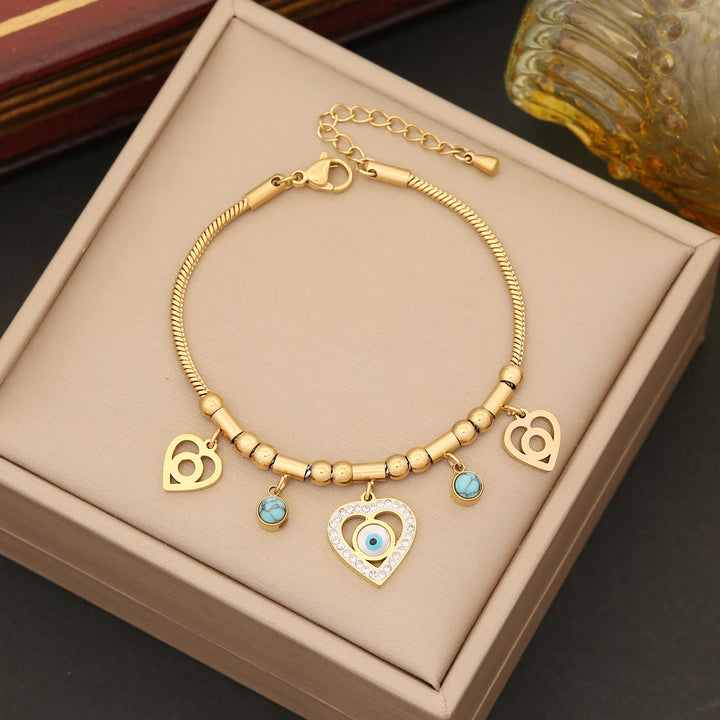 Collier et boucles d'oreilles Olivenorma en zircone turquoise avec mauvais œil 