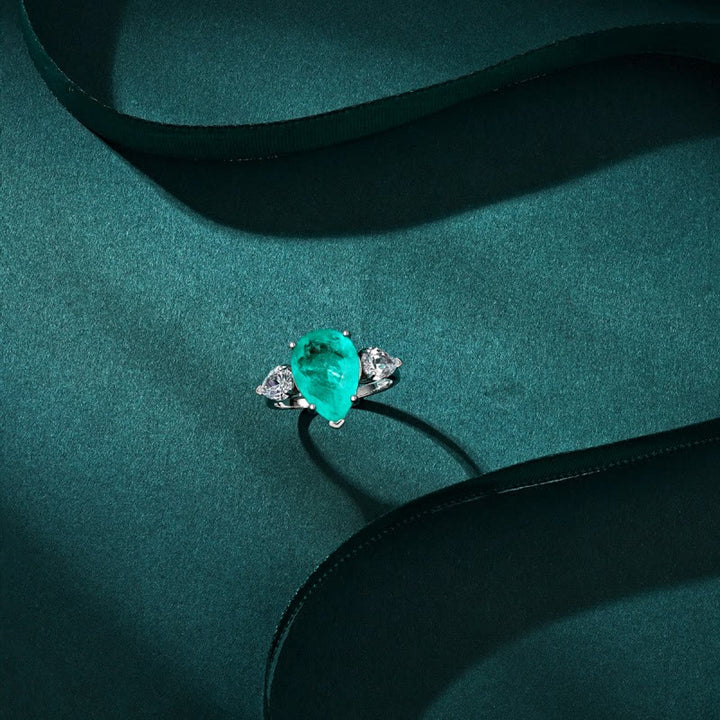 Bague exquise en zircon blanc et tourmaline Paraiba Olivenorma