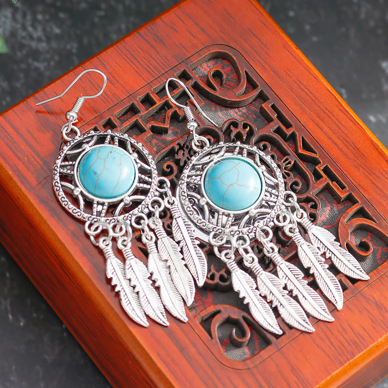 Boucles d'oreilles à pompons en plumes turquoise style bohème Olivenorma - image 4