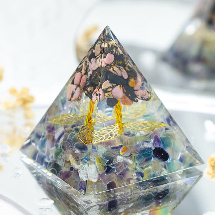 Pyramide d'orgone de croissance de rhodonite Olivenorma avec fluorite
