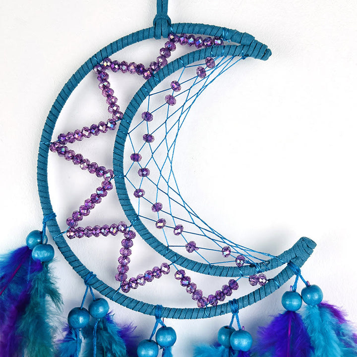 Attrape-rêves Olivenorma en perles violettes et bleues avec plumes noires