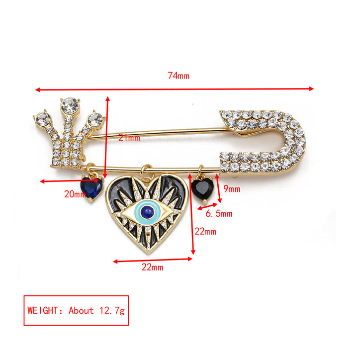 Broche en forme de cœur avec mauvais œil en zircon blanc Olivenorma 