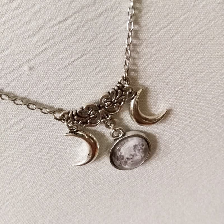 Collier en verre à double croissant de lune vintage Olivenorma