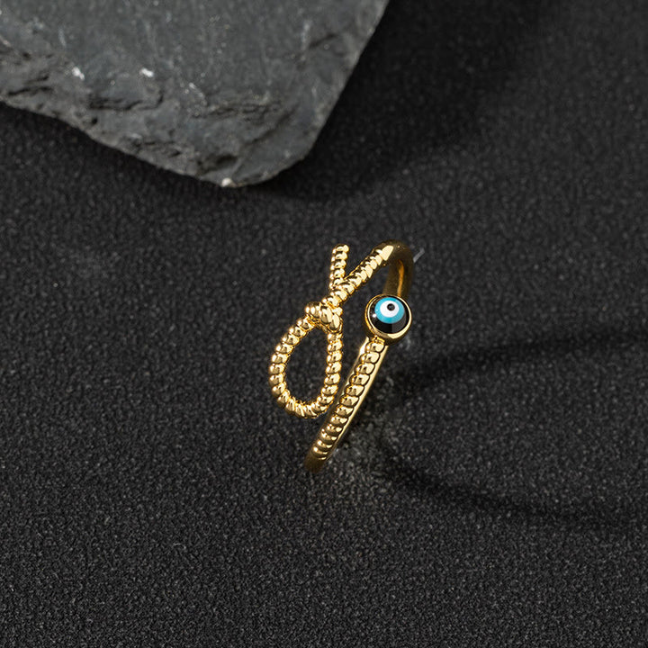 Bague ajustable Olivenorma en zircon blanc avec mauvais œil