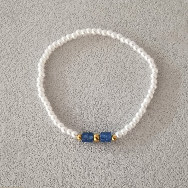 Ensemble de quatre bracelets en perles de cristal naturel Olivenorma