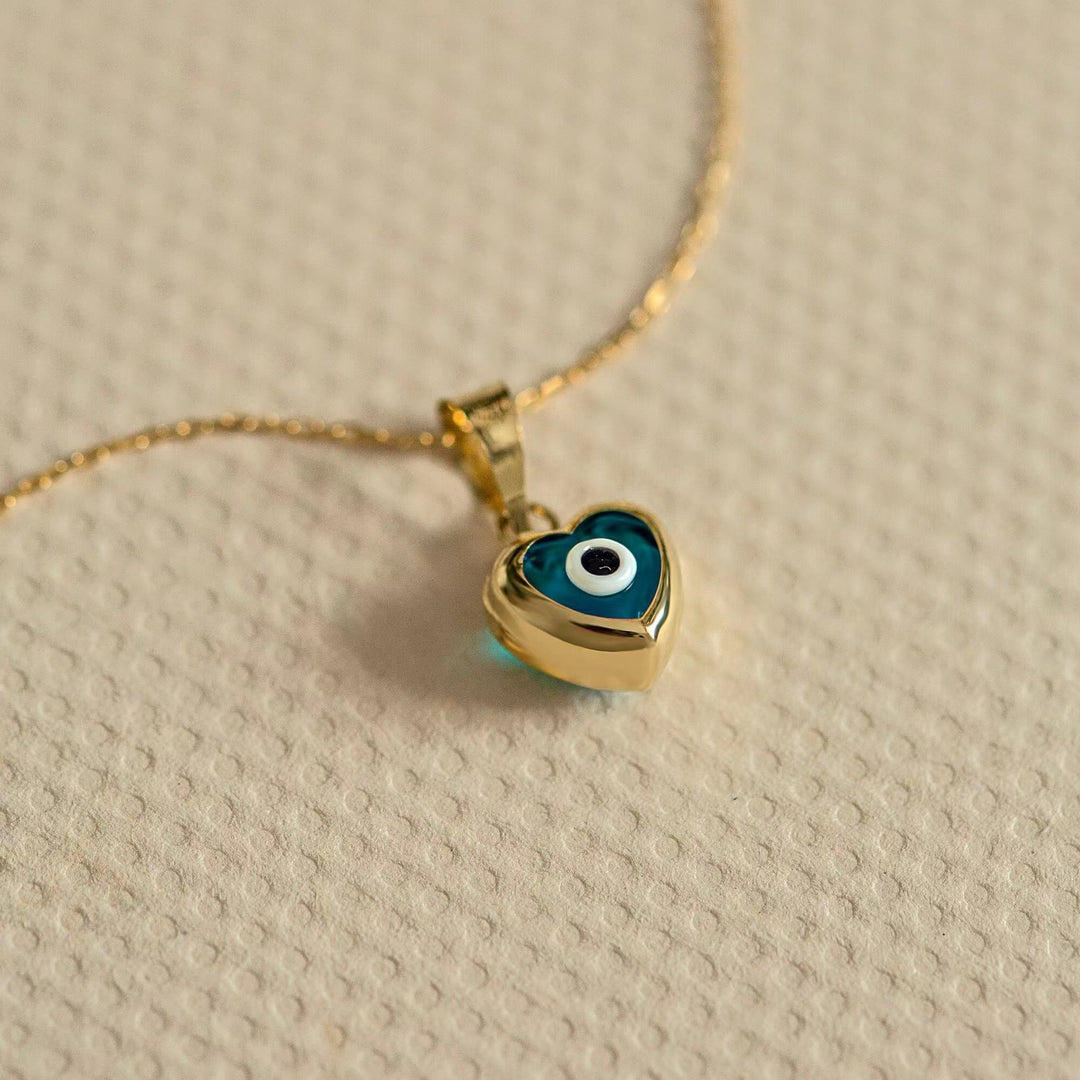 Collier en acier titane avec topaze bleue et mauvais œil Olivenorma