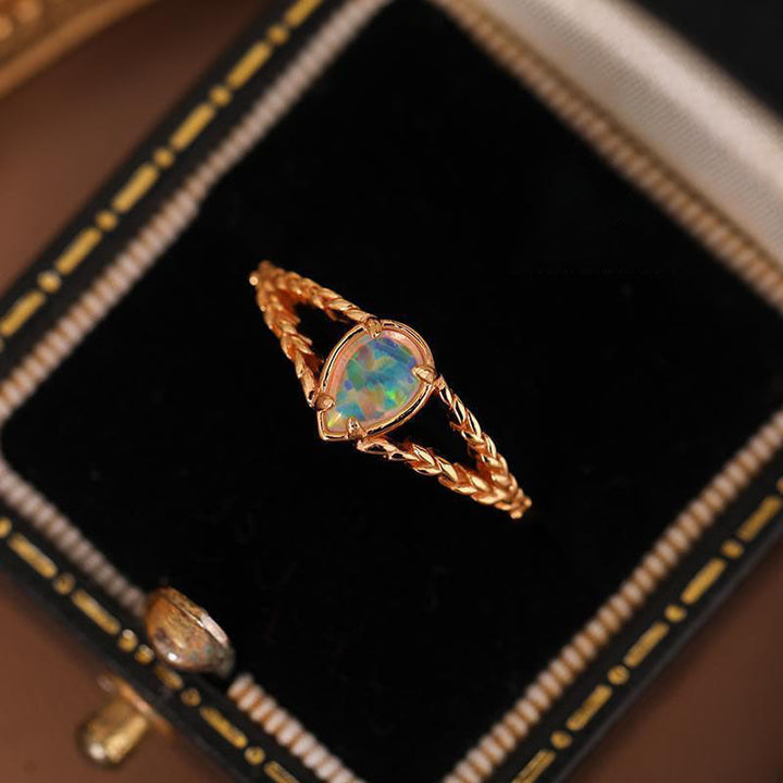 Bague creuse en or avec pierre d'opale Olivenorma
