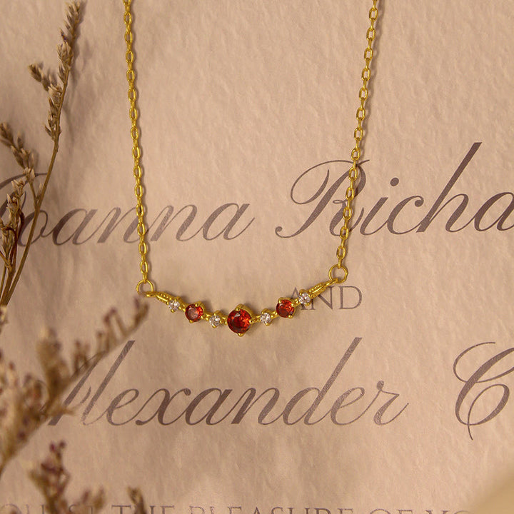 Collier Olivenorma « Symbole d'indépendance » avec diamants et grenats