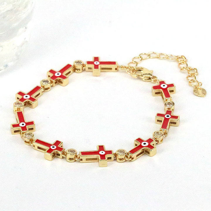 Bracelet en alliage de perles croisées contre le mauvais œil dégoulinant de couleur Olivenorma 