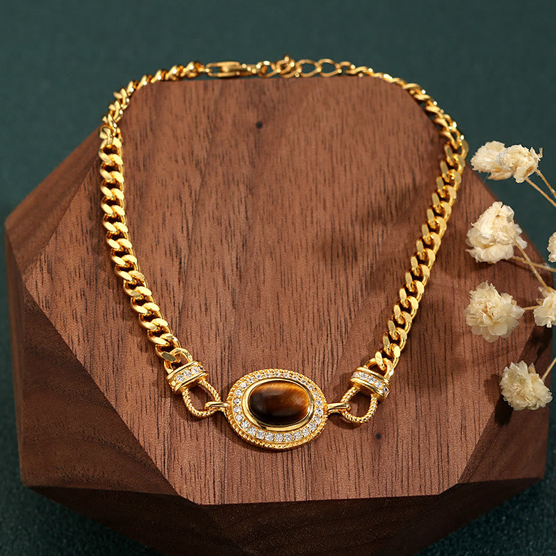 Bracelet en or oeil de tigre Olivenorma "Le livre de la galaxie"