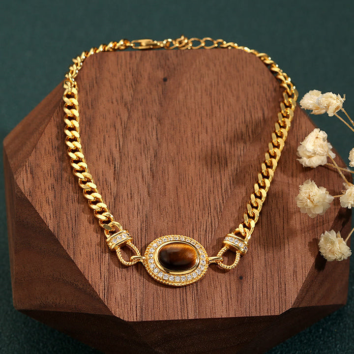 Bracelet en or oeil de tigre Olivenorma "Le livre de la galaxie"