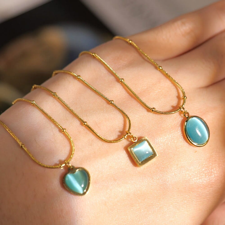 Collier pendentif carré en forme de cœur avec pierre œil de chat bleu Olivenorma 