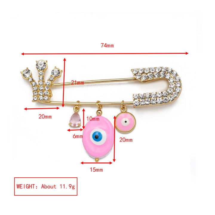 Broche en forme de cœur avec mauvais œil en zircon blanc Olivenorma 