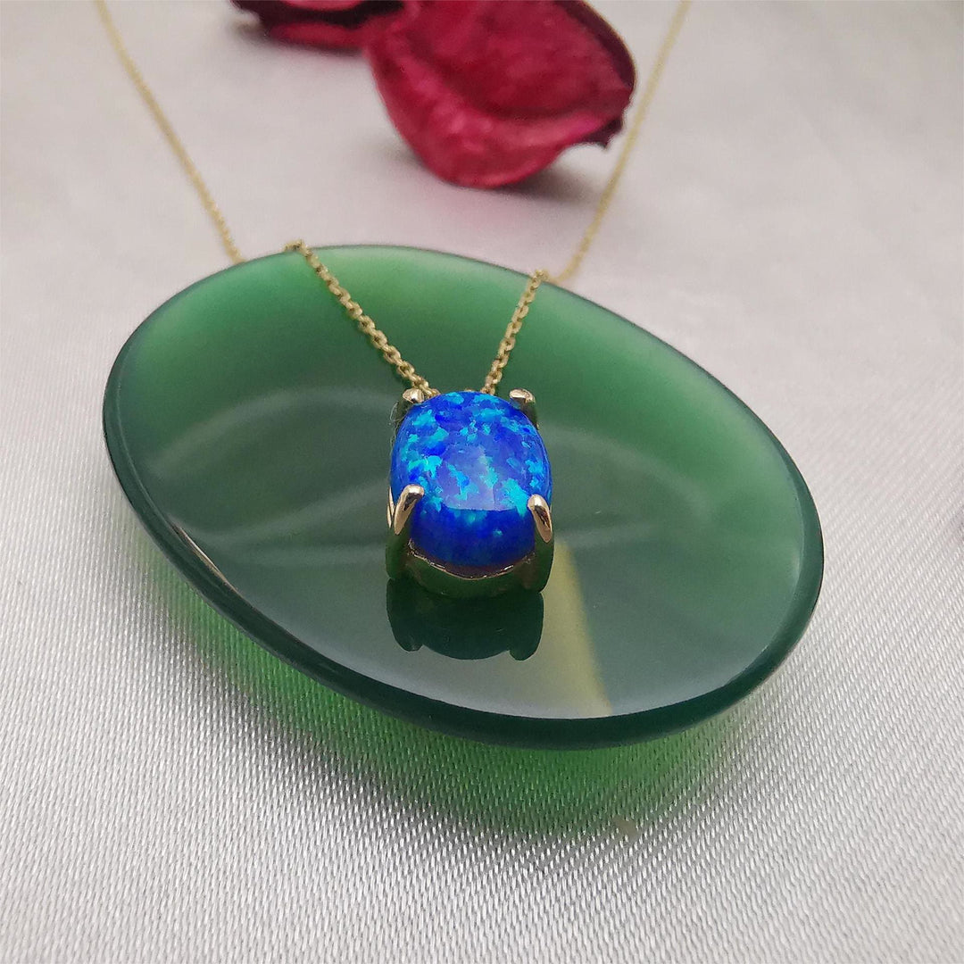 Collier en cuivre plaqué or 18 carats avec opale bleu blanc Olivenorma