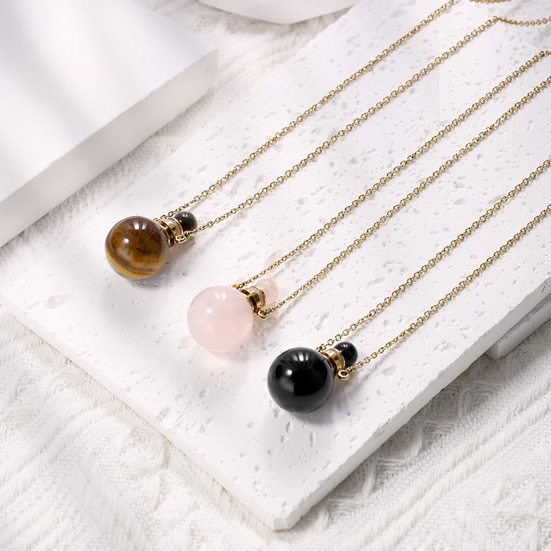 Collier pendentif bouteille de parfum en pierre ronde Olivenorma