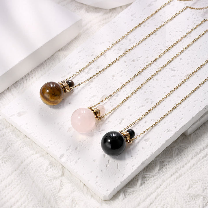 Collier pendentif bouteille de parfum en pierre ronde Olivenorma