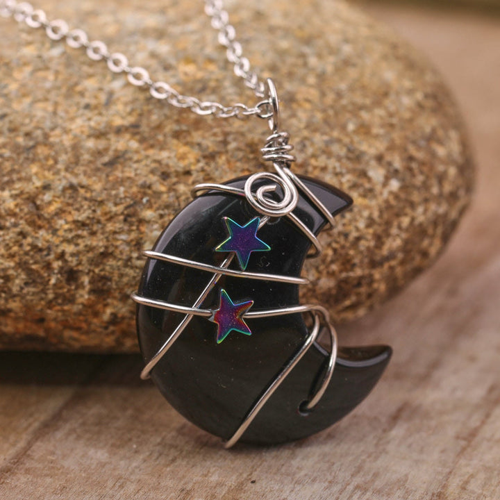 Collier étoile enveloppé de fil de lune en cristal de quartz Olivenorma