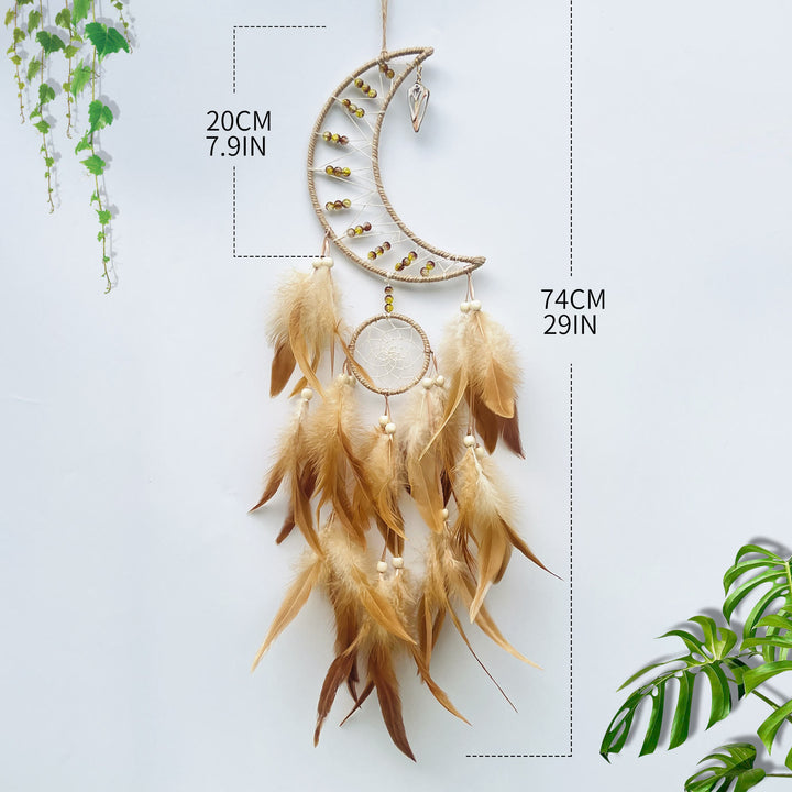 Attrape-rêves indien en plumes, étoiles, lune et soleil , Olivenorma