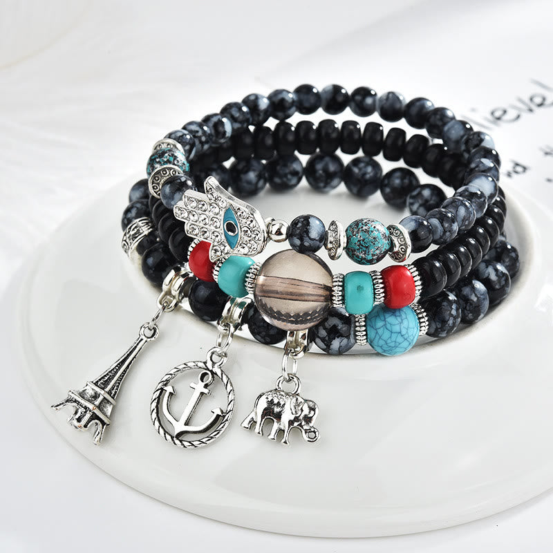 Ensemble de bracelets Hamsa contre le mauvais œil avec la tour de l'éléphant Olivenorma