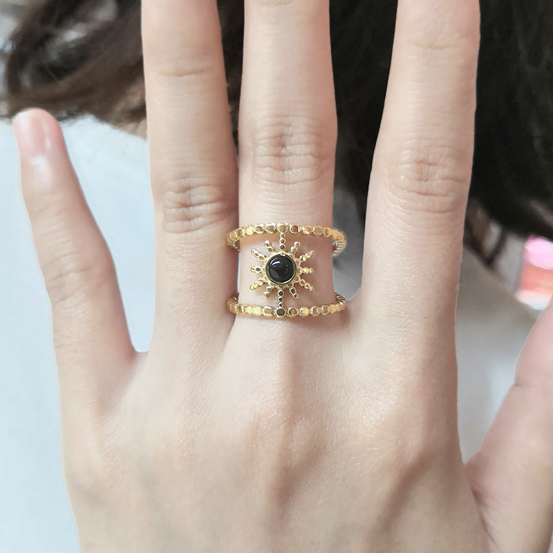 Bague Olivenorma en forme d'étoile à huit branches et à double rangée de tournesols 