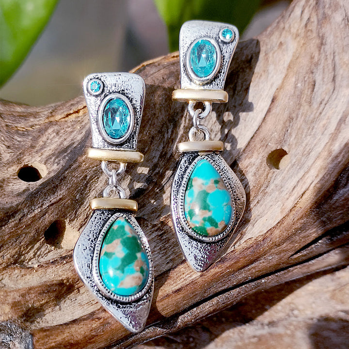 Boucles d'oreilles en argent avec topaze bleue et pierre empereur Olivenorma 