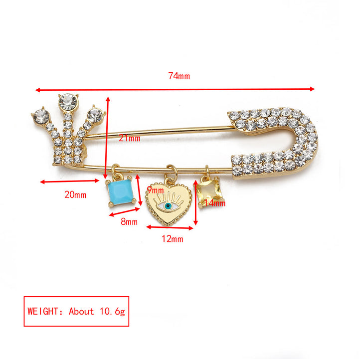 Broche en forme de cœur avec mauvais œil en zircon blanc Olivenorma 