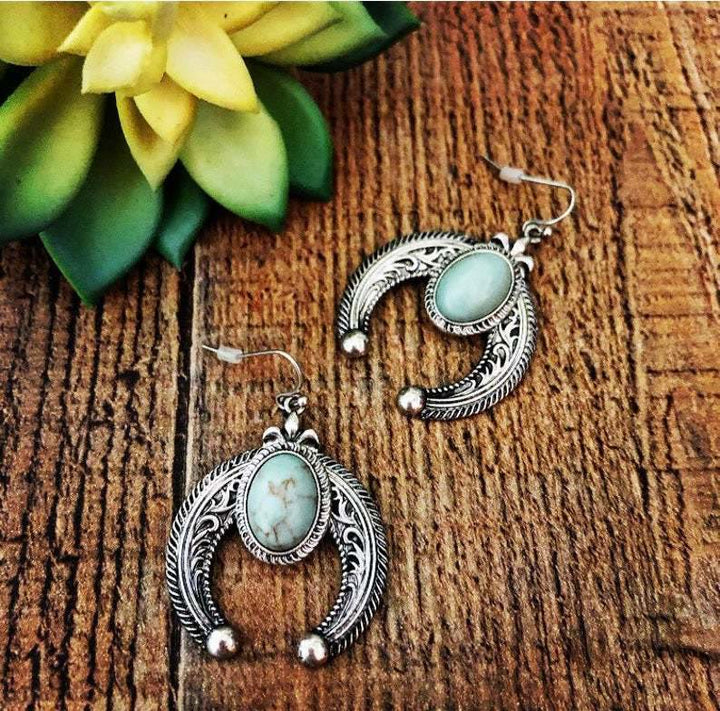 Boucles d'oreilles en turquoise sculptées en forme de croissant de lune Olivenorma