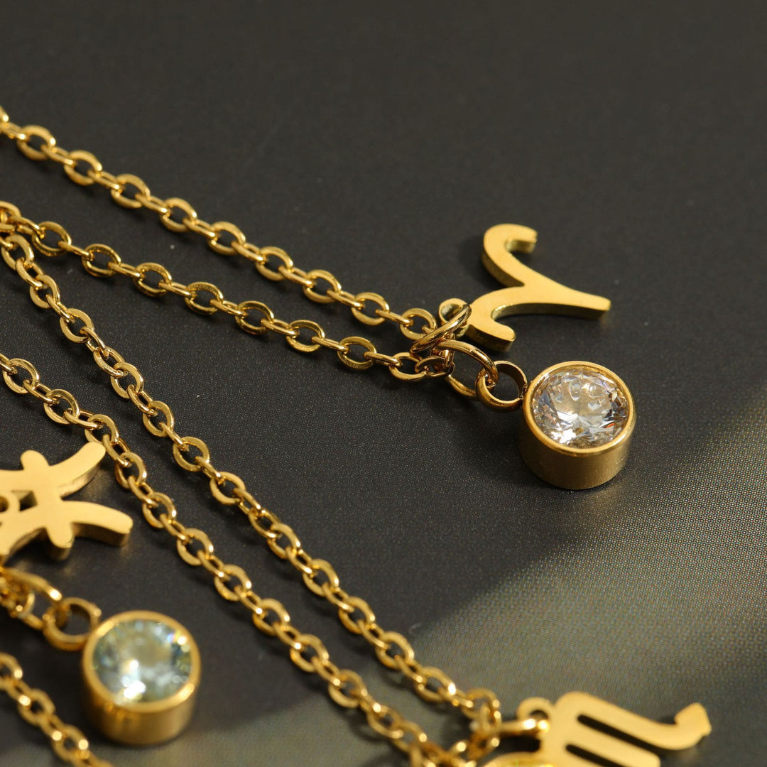 Collier en acier inoxydable avec pierre de naissance et runes du zodiaque Olivenorma