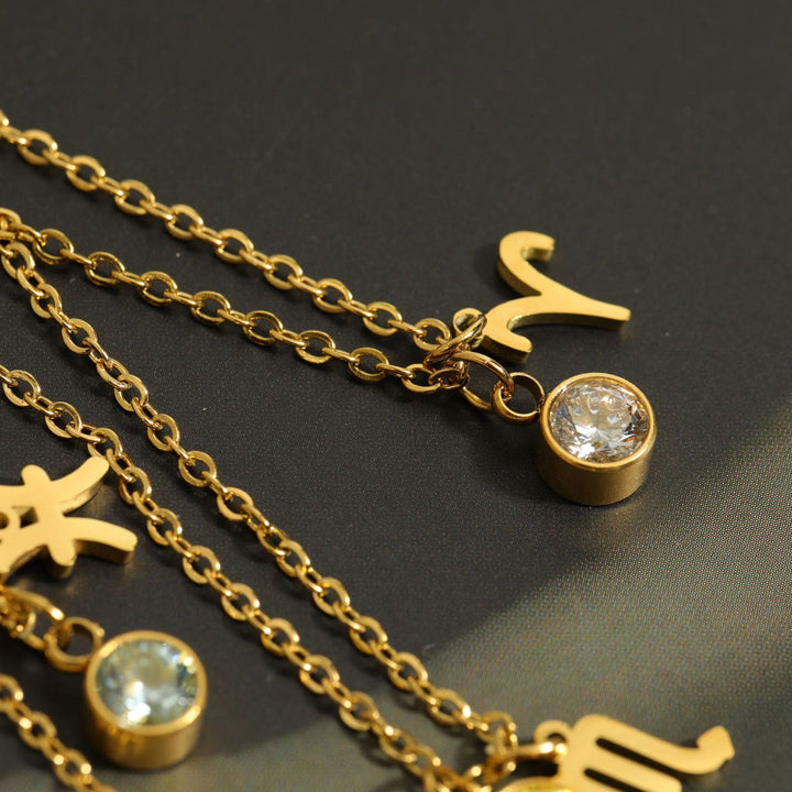 Collier en acier inoxydable avec pierre de naissance et runes du zodiaque Olivenorma